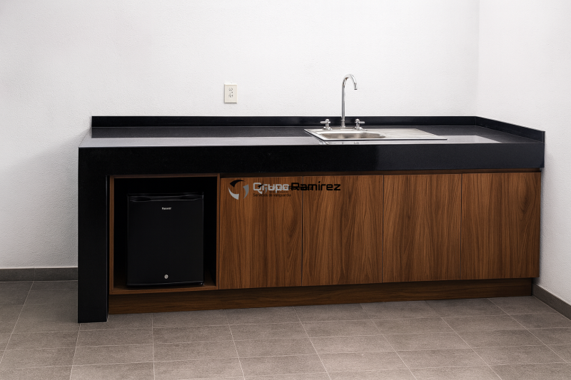 Cubierta en granito negro san gabriel con modulos en melamina rioja 