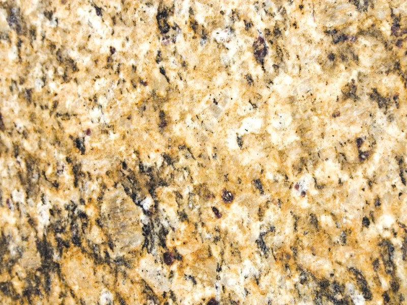 New Venentian Gold -
Granito dorado con vetas oscuras. New Venentian Gold